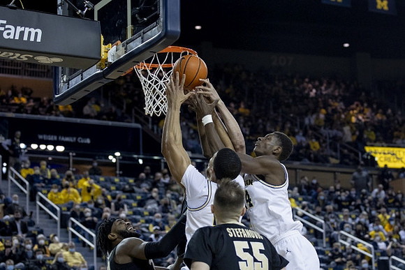 Caleb Houstan (22) and Moussa Diabate (14)