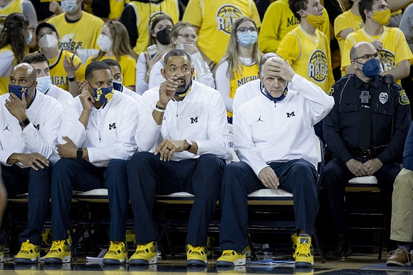 Saddi Washington, Howard Eisley, Juwan Howard, and Phil Martelli