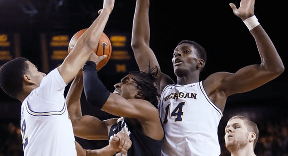 Caleb Houstan (22) and Moussa Diabate (14)