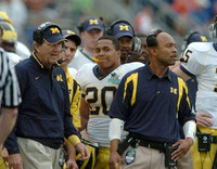 Lloyd Carr, Michael Hart, Erik Campbell, and Ryan Mallett