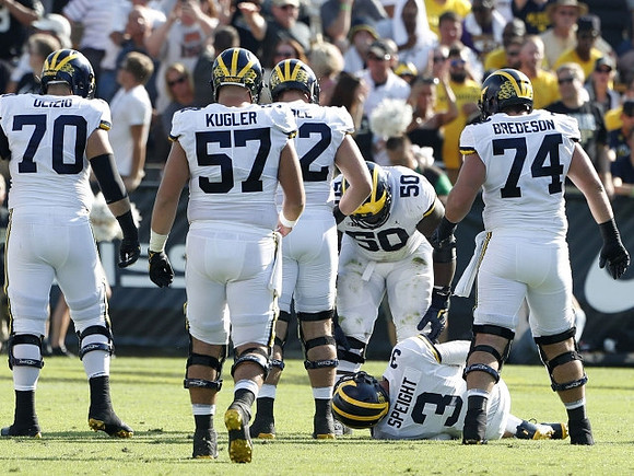 Nolan Ulizio (70), Patrick Kugler (57), Mason Cole (52), Wilton Speight (3), Michael Onwenu (50), and Ben Bredeson (74)