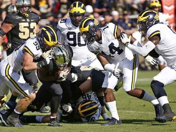 Noah Furbush (59), Bryan Mone (90), and Josh Metellus (14)