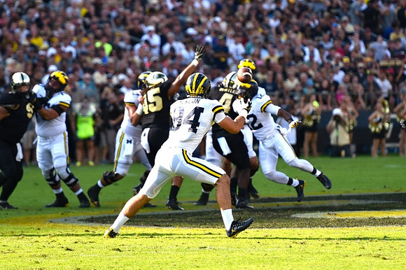 Jon Runyan Jr. (75), Sean McKeon (84), and Chris Evans (12)