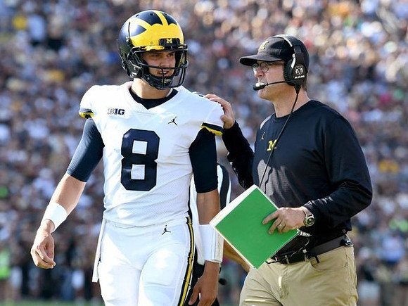 John O'Korn (8) and Jim Harbaugh