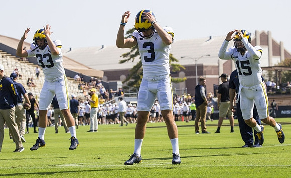 Camaron Cheeseman (33), Quinn Nordin (3), and Garrett Moores (15)