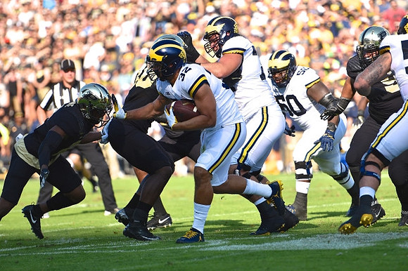 Ty Isaac (32), Nolan Ulizio (70), and Michael Onwenu (50)