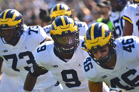 Maurice Hurst (73), Mike McCray (9), and Michael Wroblewski (46)