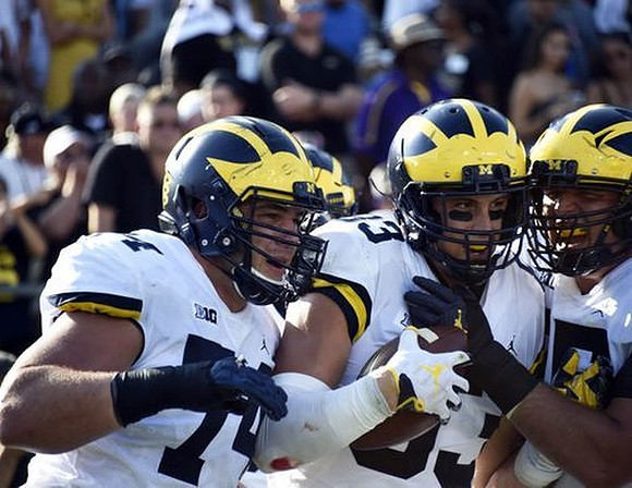Ben Bredeson (74) and Zach Gentry (83)