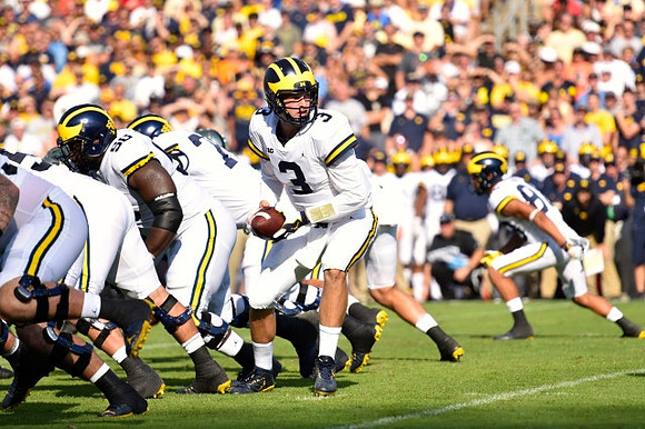 Michael Onwenu (50) and Wilton Speight (3)