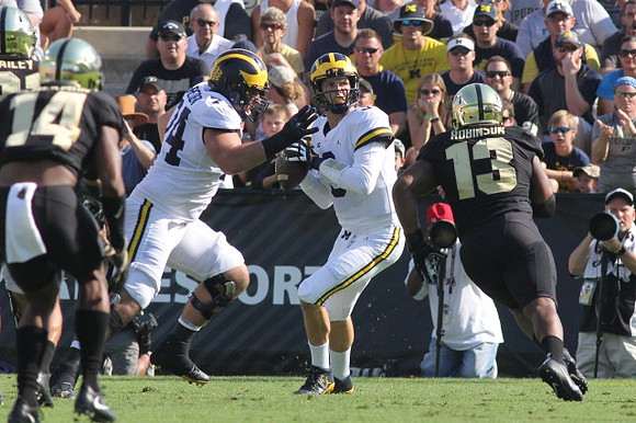 Ben Bredeson (74) and Wilton Speight (3)