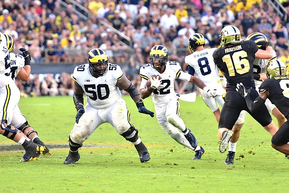 Michael Onwenu (50), Chris Evans (12), and John O'Korn (8)