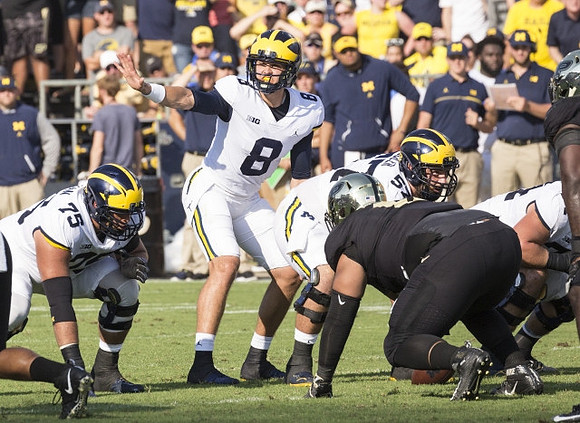Jon Runyan Jr. (75), John O'Korn (8), and Patrick Kugler (57)
