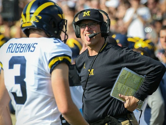 Brad Robbins (3) and Jim Harbaugh