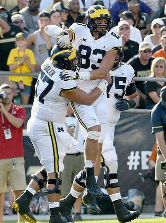 Patrick Kugler (57), Zach Gentry (83), and Jon Runyan Jr. (75)