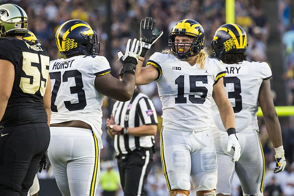Maurice Hurst (73), Chase Winovich (15), and Rashan Gary (3)