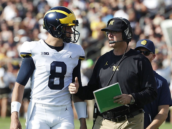 John O'Korn (8) and Jim Harbaugh