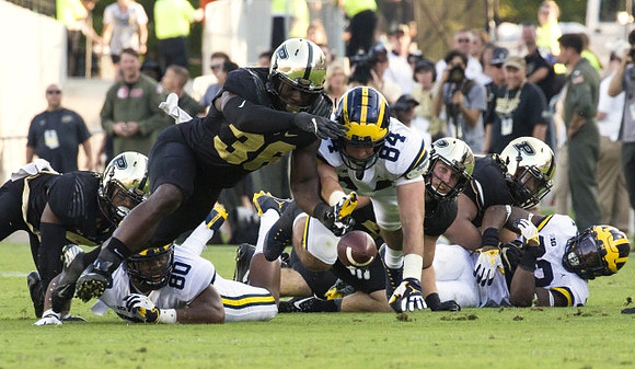 Khalid Hill (80), Sean McKeon (84), and Karan Higdon (22)