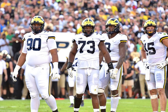 Bryan Mone (90), Maurice Hurst (73), Rashan Gary (3), and Chase Winovich (15)