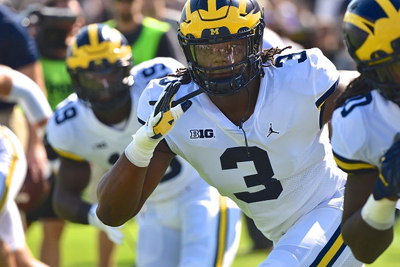 Kwity Paye (19), Rashan Gary (3), and Devin Bush (10)