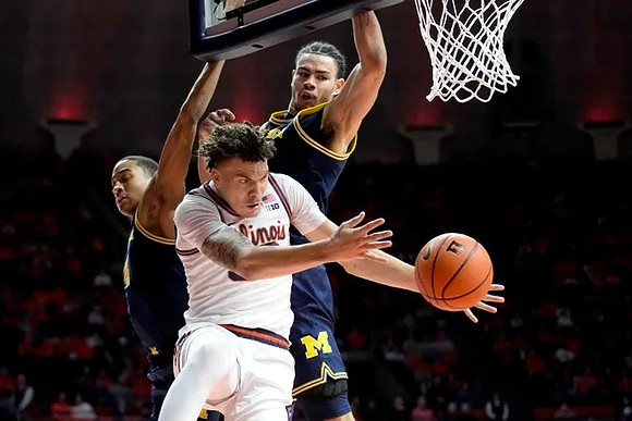 Nimari Burnett (4) and Olivier Nkamhoua (13)