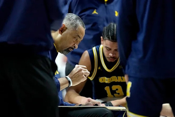 Juwan Howard and Olivier Nkamhoua (13)