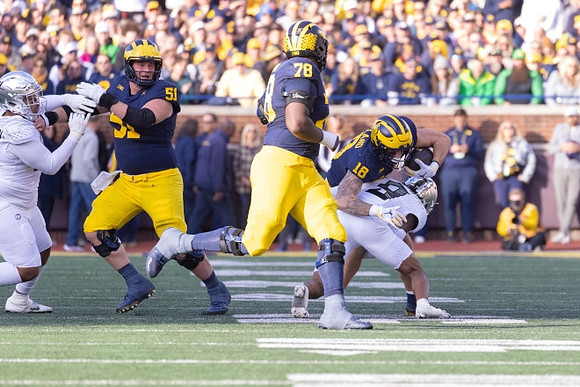 Brooks Bahr (51), Kenneth Grant (78), and Ja'Den McBurrows (18)