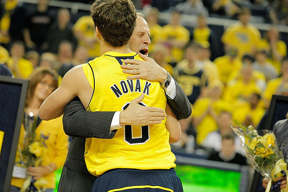 Zack Novak (0) and John Beilein