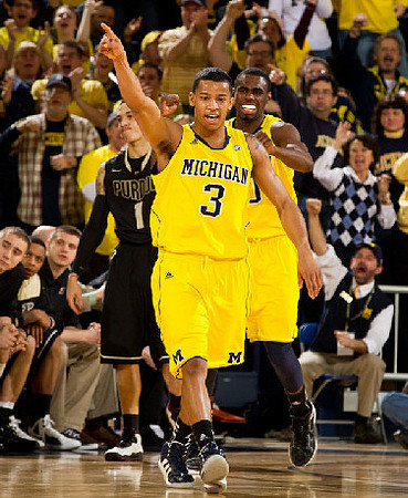 Trey Burke (3) and Tim Hardaway Jr. (10)