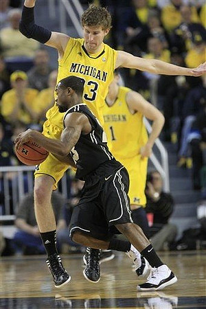 Evan Smotrycz (23) and Stu Douglass (1)