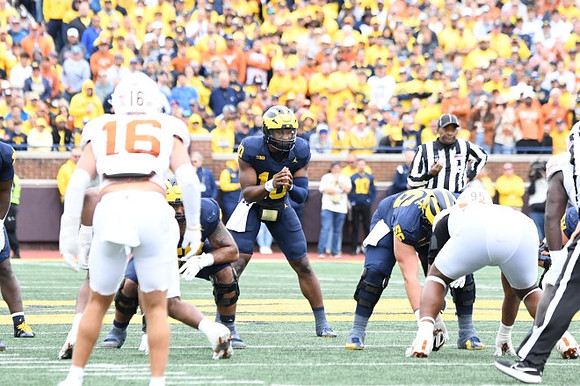Alex Orji (10) and Dominick Giudice (56)