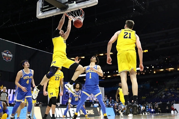 Austin Davis (51), Brandon Johns Jr. (23), Franz Wagner (21), and Chaundee Brown Jr. (15)