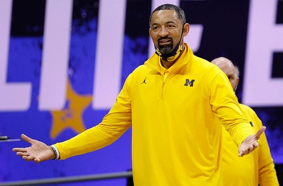 Juwan Howard and Phil Martelli