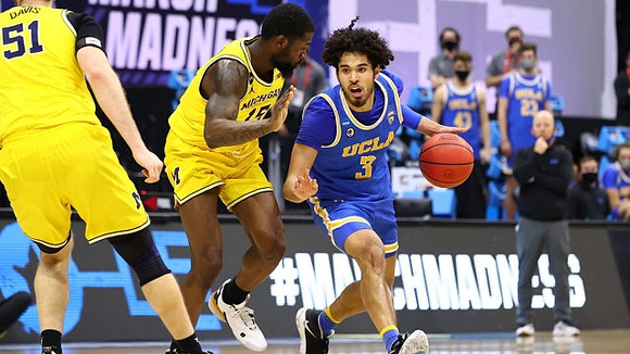 Austin Davis (51) and Chaundee Brown Jr. (15)