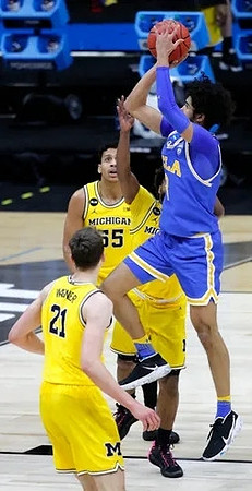 Franz Wagner (21) and Eli Brooks (55)