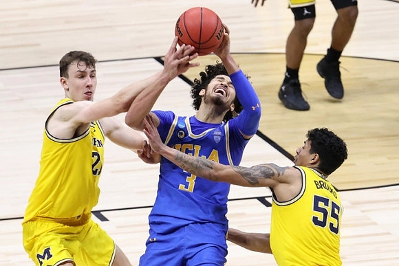 Franz Wagner (21) and Eli Brooks (55)