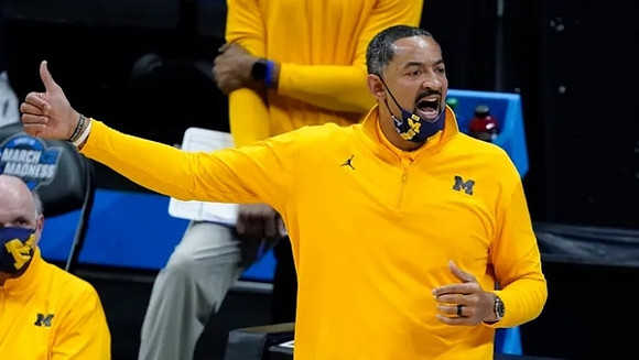 Juwan Howard and Phil Martelli