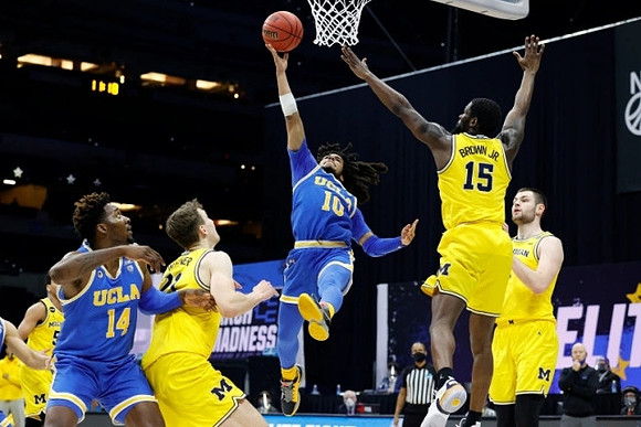 Eli Brooks (55), Franz Wagner (21), Chaundee Brown Jr. (15), and Hunter Dickinson (1)