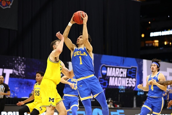 Eli Brooks (55) and Franz Wagner (21)