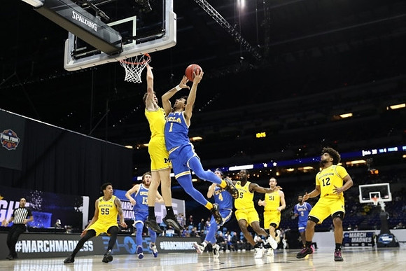Eli Brooks (55), Franz Wagner (21), Chaundee Brown Jr. (15), Austin Davis (51), and Mike Smith (12)