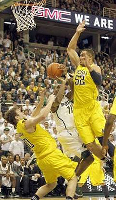 Zack Novak (0) and Jordan Morgan (52)
