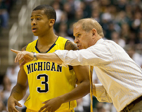 Trey Burke (3) and John Beilein
