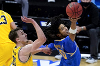 Franz Wagner (21) and Brandon Johns Jr. (23)