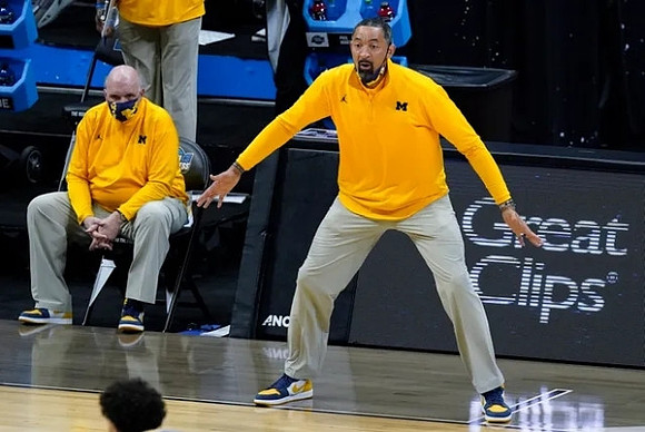 Juwan Howard and Phil Martelli