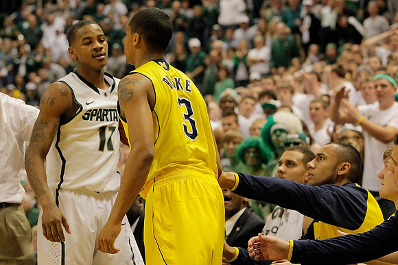 Trey Burke (3), Jordan Morgan (52), Jon Horford (15), and Matt Vogrich (13)