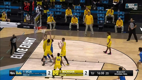 Franz Wagner (21), Brandon Johns Jr. (23), Eli Brooks (55), Hunter Dickinson (1), and Mike Smith (12)