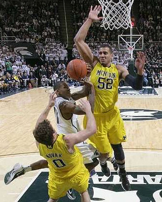 Zack Novak (0) and Jordan Morgan (52)