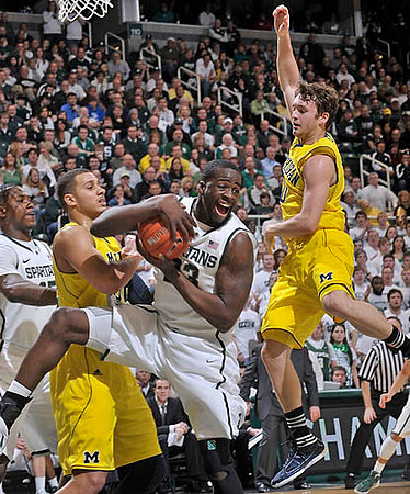 Jordan Morgan (52) and Zack Novak (0)