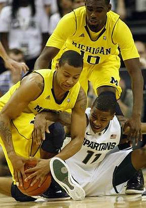Trey Burke (3) and Tim Hardaway Jr. (10)