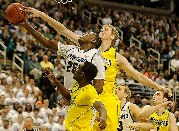 Tim Hardaway Jr. (10), Blake McLimans (22), and Stu Douglass (1)
