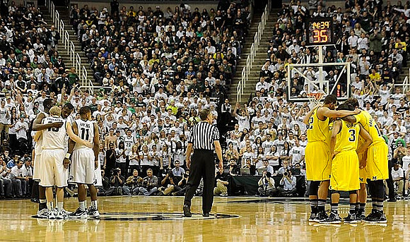 Jordan Morgan (52), Trey Burke (3), and Tim Hardaway Jr. (10)